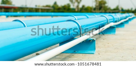 Similar – Image, Stock Photo A blue water pipe on a construction site