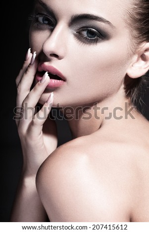 Portrait of beautiful young woman with clean face