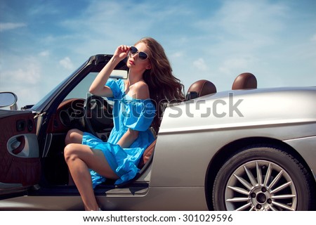 Beautiful girl in the car