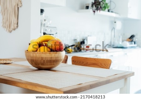 Similar – Foto Bild Runde Obstschale mit Banane, Pfirsich und Avocado auf grauem Betonboden in einer Designerwohnung in Rudersau bei Rottenbuch im Kreis Weilheim-Schongau in Oberbayern