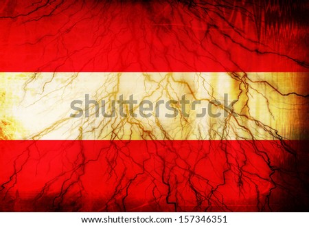 Austrian flag waving in the wind with some spots and stains