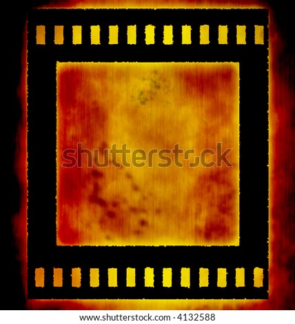Old negative film strip on burning background