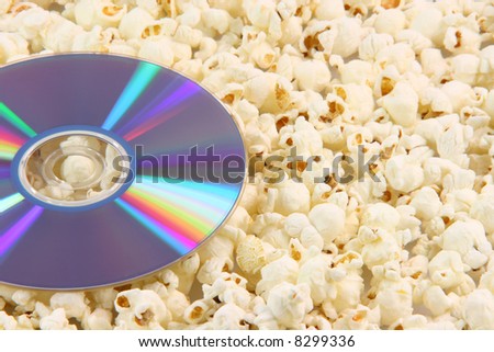 dvd disc movie on pop corn background food  entertainment dvd store concepts