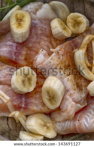Fresh  fish pickled with a banana