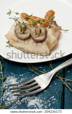 baked fish with banana and with sauce