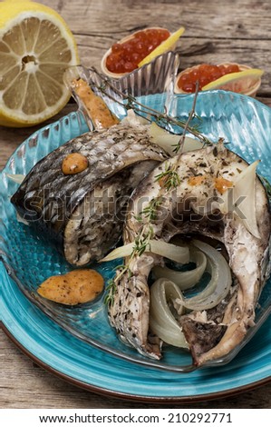piece of fragrant roasted fish in sauce and spices