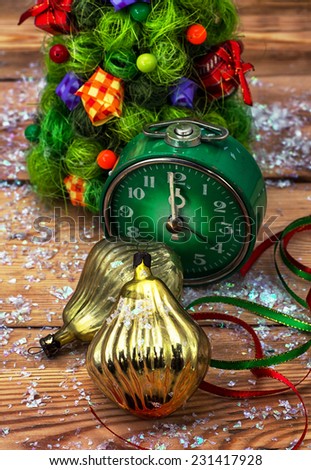 green old-fashioned clock and Christmas ornaments