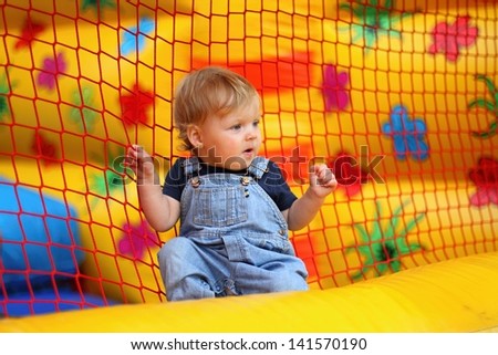 little girl on the bouncy castle