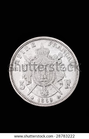 French ancient silver coin (Emperpr Napoleon III, 5 francs, 1869). Reverse. Path on the black background.