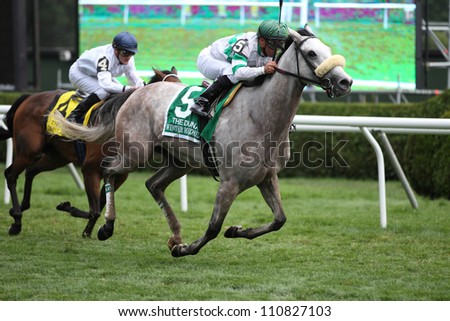 SARATOGA SPRINGS, NY - JULY 28: Jockey Javier Castellano aboard Winter Memories wins The Diana Stakes on July 28, 2012 Saratoga Springs, New York