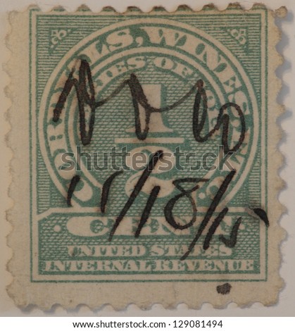UNITED STATES - CIRCA 1915: Wine Tax stamp printed in United states (USA), Shows hand cancel , circa 1915