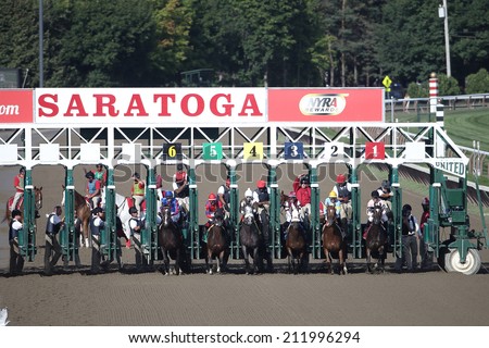 SARATOGA SPRINGS, NY - August 18, 2014: The field breaks in the First Running of the Summer Colony Stakes at Historic Saratoga Race Course on August 18, 2014 Saratoga Springs, New York