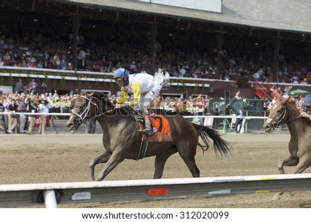 SARATOGA SPRINGS, NY - August 29, 2015: Unbridled Forever with J R. Velazquez up wins the Ballerina Stakes on Travers Day at Historic Saratoga Race Course on August 29, 2015 Saratoga Springs, New York