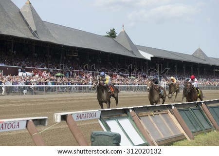 SARATOGA SPRINGS, NY - August 29, 2015: Unbridled Forever with J R. Velazquez up wins the Ballerina Stakes on Travers Day at Historic Saratoga Race Course on August 29, 2015 Saratoga Springs, New York