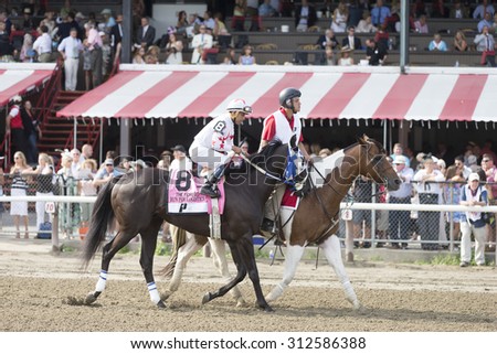 SARATOGA SPRINGS, NY - August 29, 2015: Private Zone ridden by M. Pedroza wins the King\'s Bishop Stakes on Travers Day at Historic Saratoga Race Course on August 29, 2015 Saratoga Springs, New York