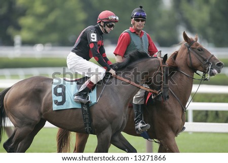 Jockey and Pony Boy on Track Before race