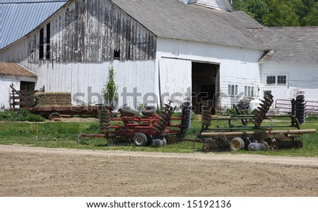 Farm Equipment Sit Idle outside of a Rural New York Farm