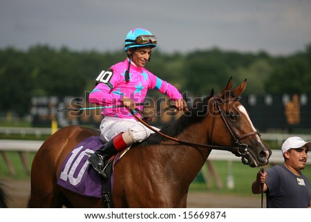 SARATOGA SPRINGS - August 2: A happy jockey John Velazquez aboard winning horse Heather\'s Angel August 2, 2008 in Saratoga Springs, NY.