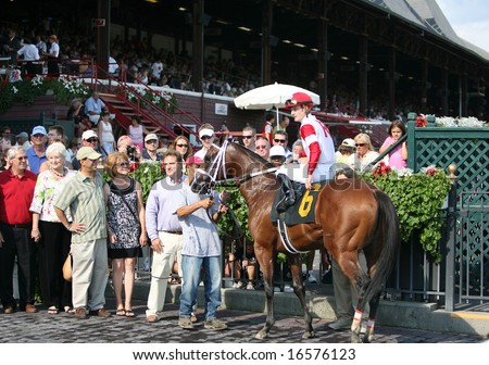 SARATOGA SPRINGS - August 17: Julien Leparoux Aboard Ridge Royale In the Winners Circle after the Seventh race August 17, 2008 in Saratoga Springs, NY.