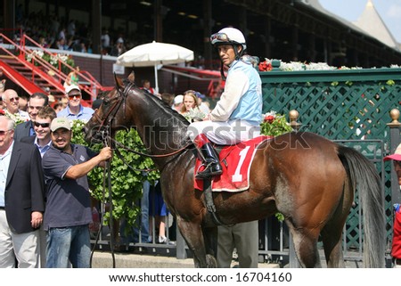 SARATOGA SPRINGS - August 18: Edgar S. Prado on Law N Dora before in the winners circle after the Fourth Race  August 18, 2008 in Saratoga Springs, NY