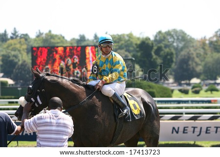 SARATOGA SPRINGS - August 22: Oldham with Sebastian Morales Aboard Outside the Winners Circle After the First race August 22, 2008 in Saratoga Springs, NY.