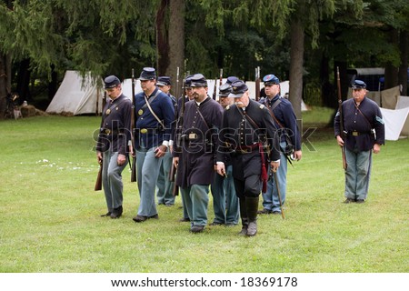 MENANDS - September 13: A Company of Union Troops Marches off the Field During a Civil War Reenactment at the Albany Rural Cemetery on September 13, 2008 in Menands, NY.
