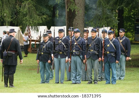 MENANDS - September 13: Union Soldiers Ready for Inspection  During a Civil War Reenactment at the Albany Rural Cemetery on September 13, 2008 in Menands, NY.