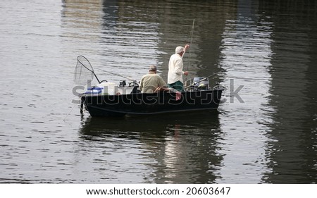 Two older Fisherman set there lines for Stripped Bass in the Hudson River in Spring
