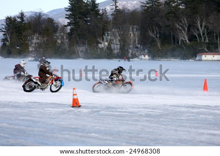 LAKE GEORGE, NEW YORK- FEBRUARY 14: Motorcycles race on the frozen lake during the 2009 Winter Carnival on February 14, 2009 in Lake George, NY.