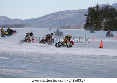 LAKE GEORGE, NEW YORK- FEBRUARY 14: Motorcycles race on the frozen lake during the 2009 Winter Carnival on February 14, 2009 in Lake George, NY.
