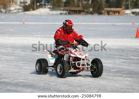 LAKE GEORGE, NEW YORK- FEBRUARY 14: Quad Race Leaves Ice after finish of Quad Race on the frozen lake during the 2009 Winter Carnival on February 14, 2009 in Lake George, NY.