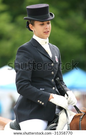 SARATOGA SPRINGS - MAY 23: Stephanie Nowak after competing on Coriall the Junior Division at the Dressage May 23, 2009 in Saratoga Springs, NY.