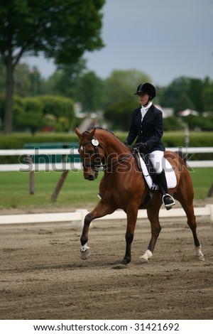 SARATOGA SPRINGS - MAY 23: Sian Walker competes on Promise R in the Junior Division at the Dressage May 23, 2009 in Saratoga Springs, NY.