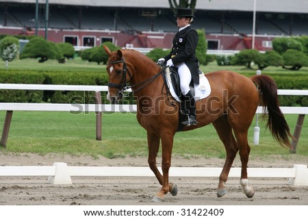 SARATOGA SPRINGS - MAY 23: Alexa Rice competes on Maarten in Junior Division at the Dressage May 23, 2009 in Saratoga Springs, NY.