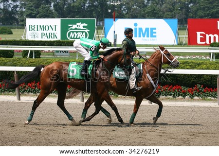 ELMONT, NY- JULY 25: Amanda Casey abord Passing Dream in the post parade for the forth race at Belmont Park- July 25, 2009 in Elmont, NY.