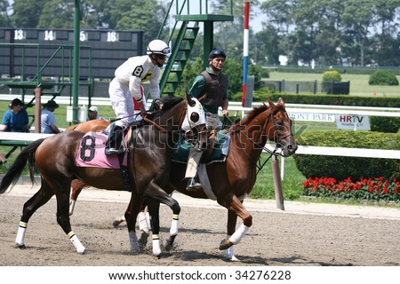 ELMONT, NY- JULY 25: Jesus Castonon abord Gold Prospect in the post parade for the forth race at Belmont Park- July 25, 2009 in Elmont, NY.