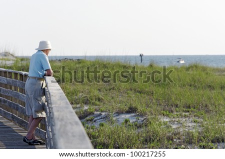 A senior man enjoying the view on the Alabama gulf coast.