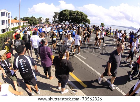 AUCKLAND - MARCH 13: Participants of Auckland Round the Bays, one of the world\'s largest fun walk and run with an estimated 70,000 entrants, in Auckland, New Zealand on Sunday March 13, 2011.