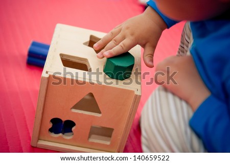 Similar – Image, Stock Photo Close up toddler hand on the table