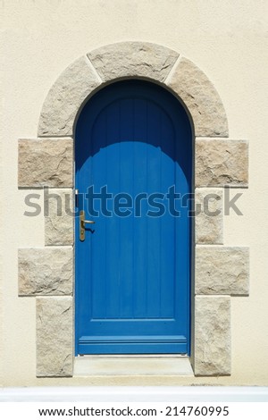 Blue wooden arch door in CÃ?Â´tes-d\'Armor, France