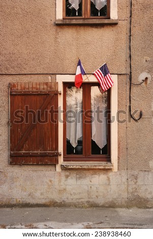 French and American flags at a house near Utah Beach, Normandy, France