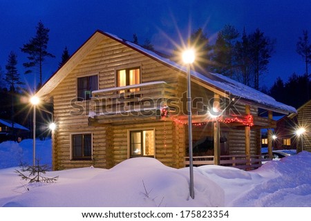 wooden house in winter