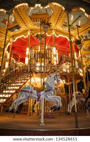 Wooden horse on an old-fashioned merry-go-round in Paris, France