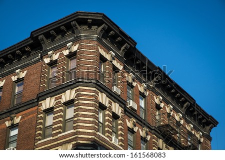 Classic old brown-brick apartment building in New York City