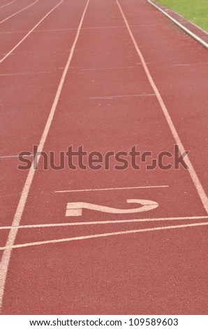 number two on the start of a running track