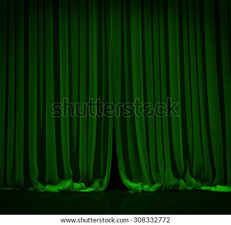 Green curtain with spot light on theater or cinema stage.