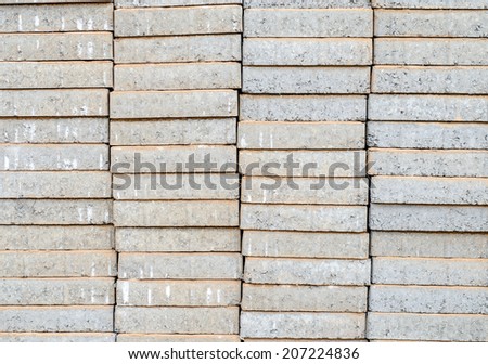 Pallets of breeze blocks at a construction site from a builders merchant known as cinder blocks in the us or Concrete masonry units
