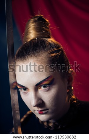 young woman with razor portrait