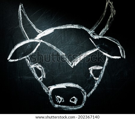 cow on a blackboard