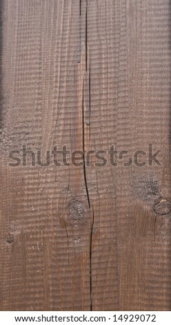 texture of dark lacquered wood with cracks and knots
